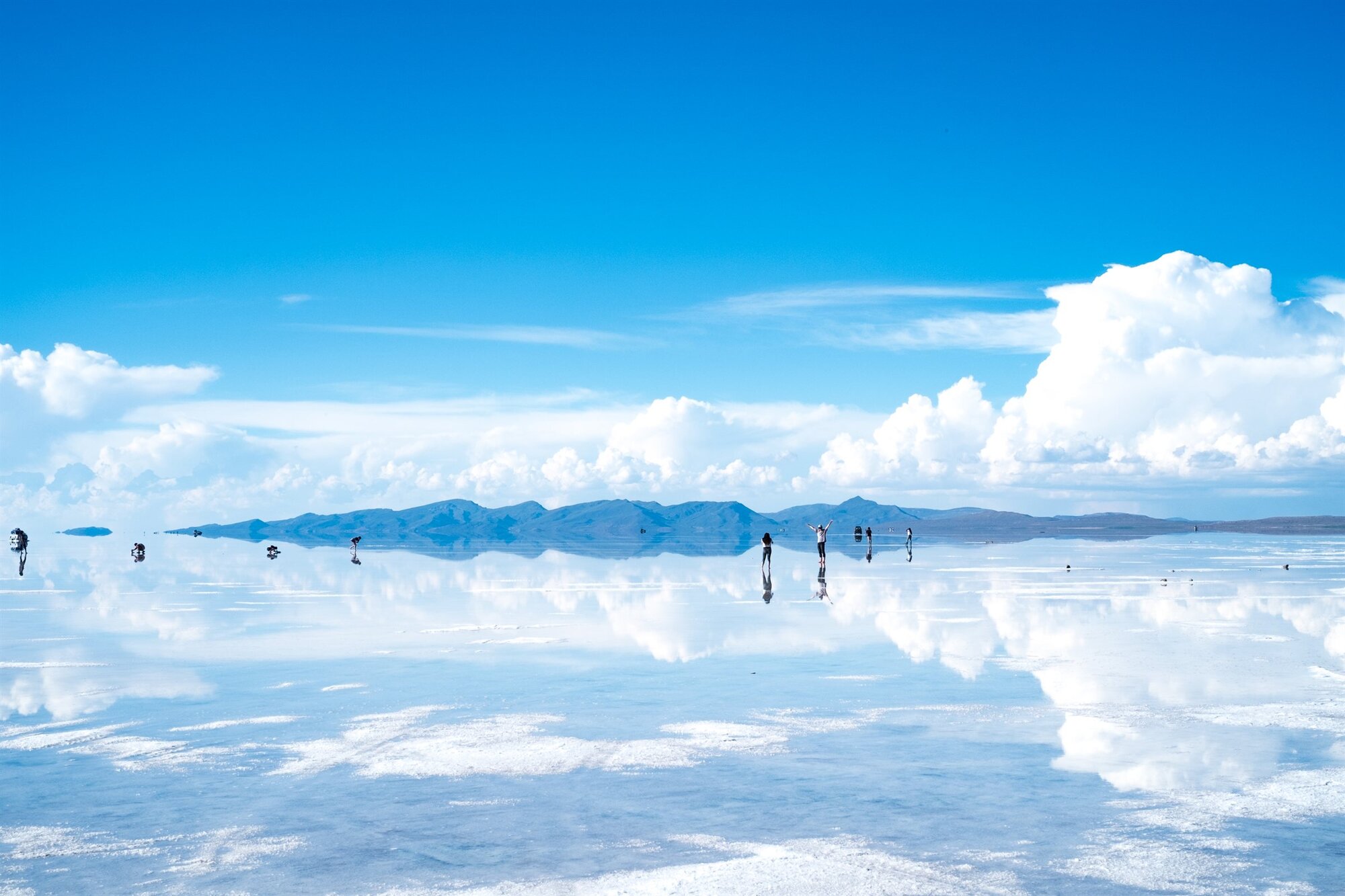 Clouds mirrored perfectly on the salt flats