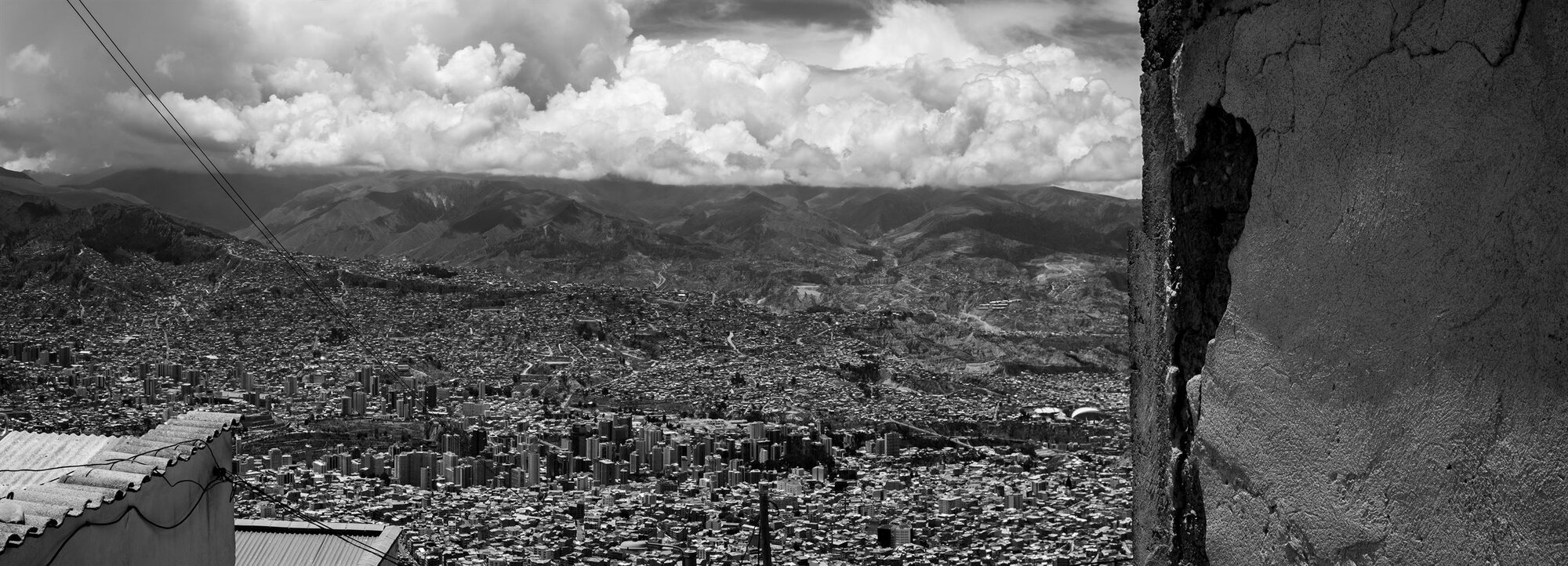 La Paz spread across its valley beside a rock face