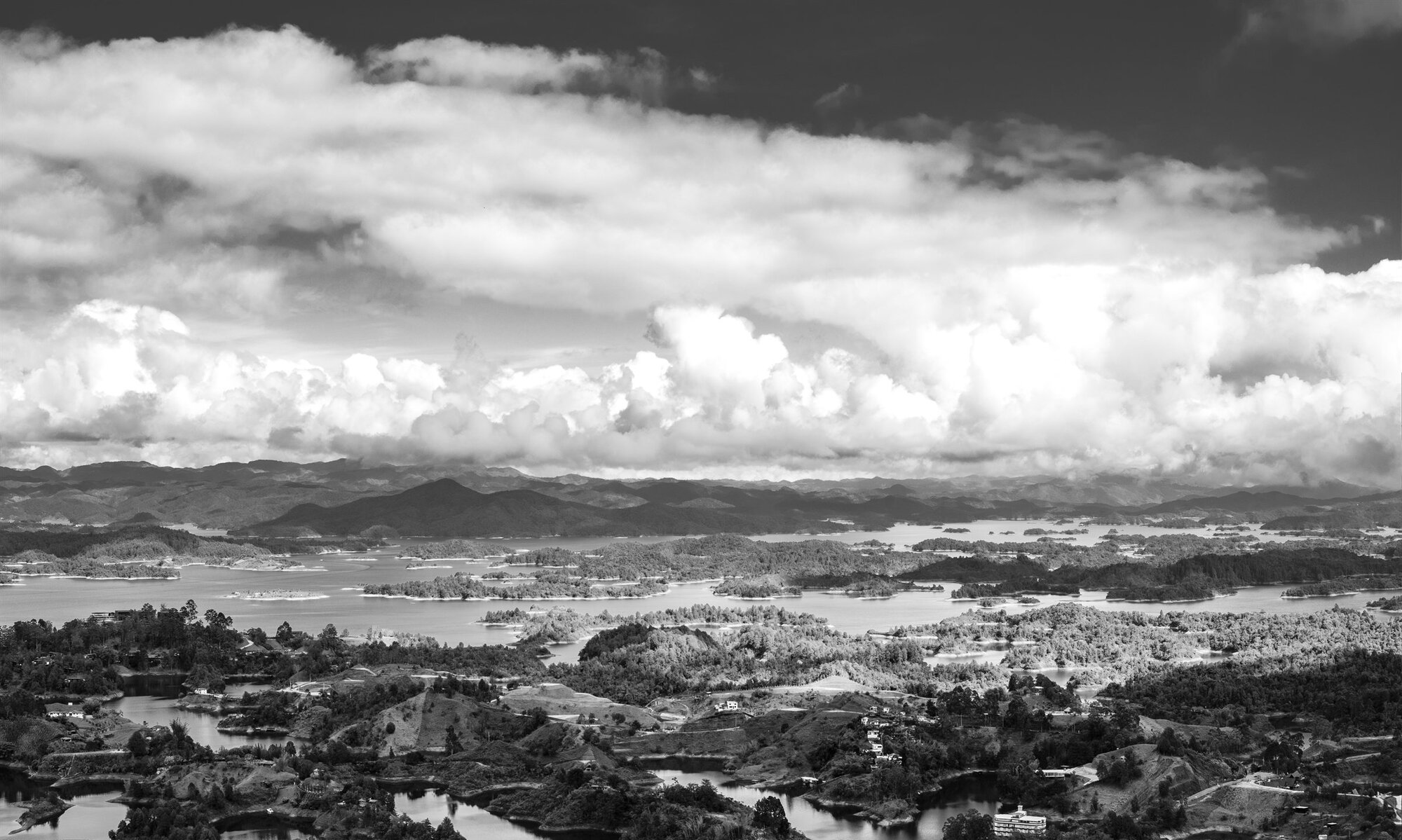 Heaped clouds over the lakes and hills